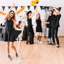 teenagers-dark-clothes-smiling-dancing-party (1)